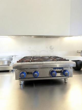 Imperial 4-Burner Gas Hot Plate, excellent condition, tested, blue knobs, stainless steel, natural gas, front view.