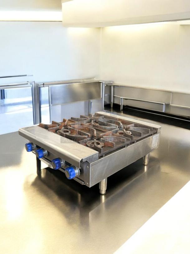 Imperial 4-Burner Gas Hot Plate in excellent condition, natural gas, fully tested and working, with blue control knobs.