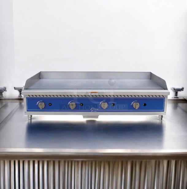 "Globe 48\" Commercial Gas Griddle, excellent condition, fully tested, three control knobs, blue front panel."