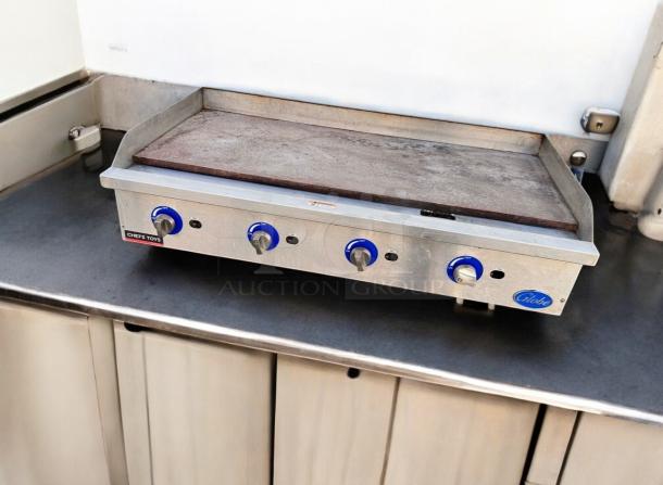 Globe 48" gas griddle, excellent condition, commercial series, fully tested, stainless steel, control knobs visible, operational.
