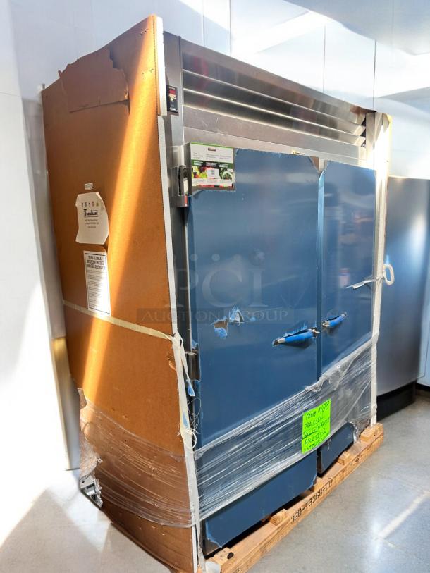 Brand new Traulsen AR23ZL-1 roll-in refrigerator, left hinge solid door, factory sealed, 115V, in original packaging.