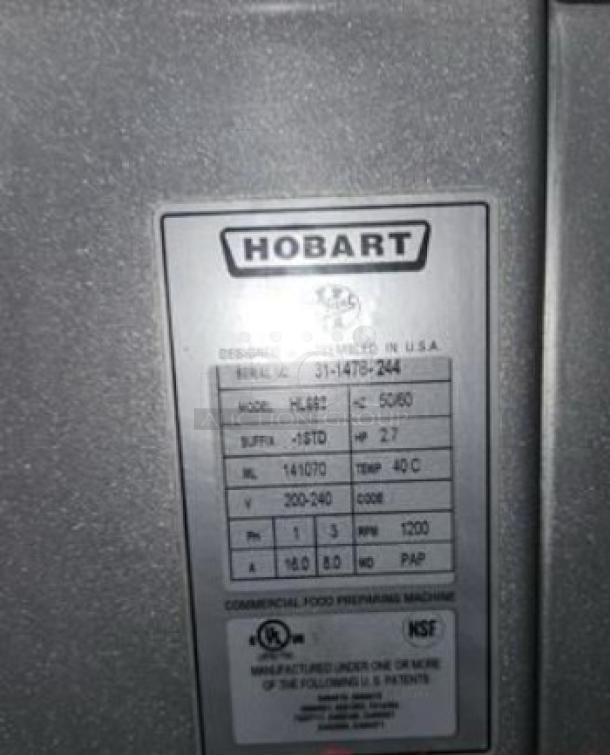 Hobart H600 60-quart planetary mixer label, indicating model, voltage (200-240V), and fully tested condition.