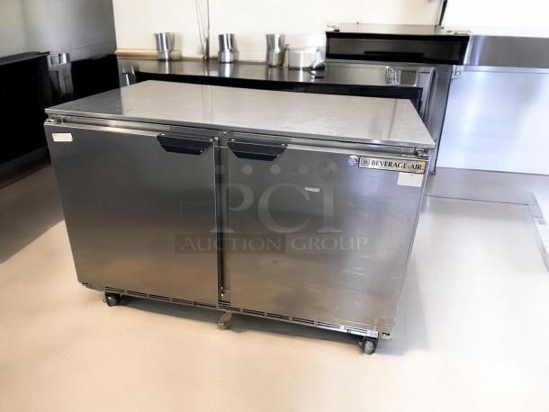 Beverage-Air UCR48A-23 undercounter refrigerator, 48" wide, dual solid doors, top-tier condition, fully tested, on casters.