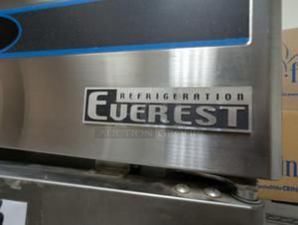 Everest ESR2 two-door reach-in refrigerator, stainless steel exterior, Everest Refrigeration logo visible, excellent condition.