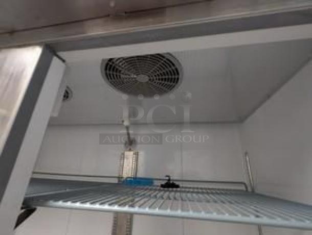 Turbo Air TSR-49-HC two-door reach-in refrigerator. Interior view showing shelving and fan. Superb condition, fully tested.