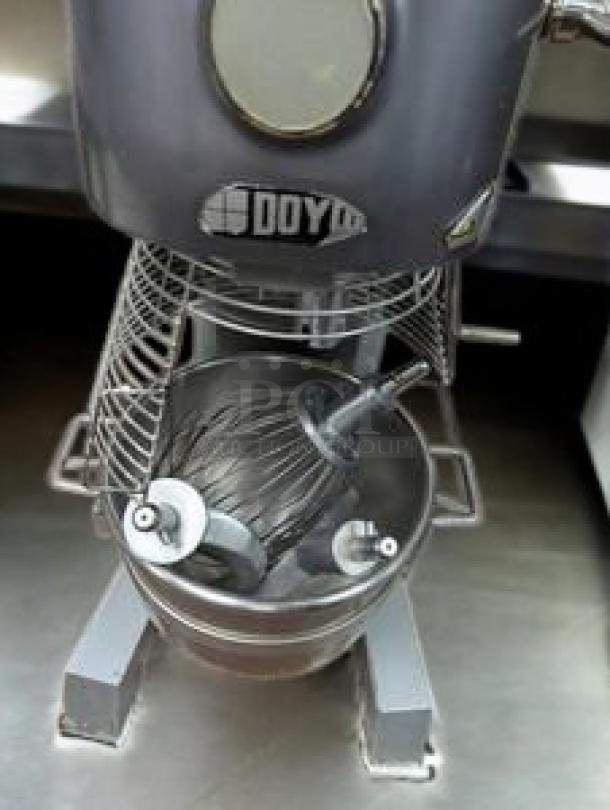 Doyon EM30 30 Qt. Vertical Food Mixer in immaculate condition, showcasing stainless steel bowl and attachments, 220V model.