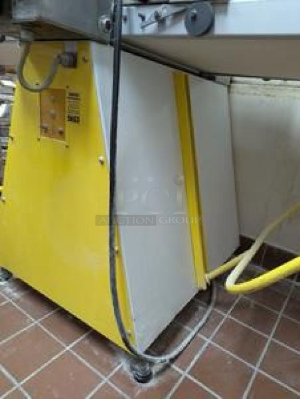 Rondo Commercial Dough Sheeter, floor model in superb condition. Yellow and white casing, fully tested and working.