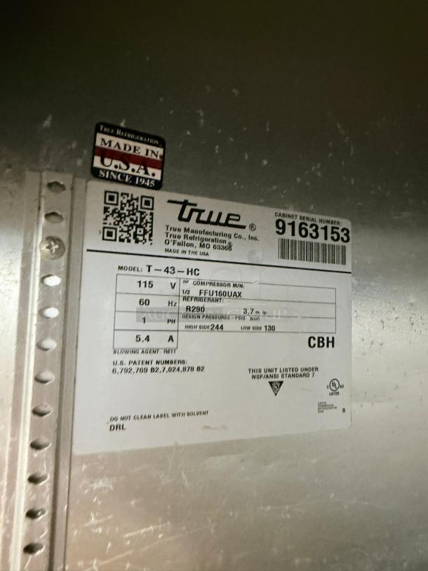 Alt Text: True T-43-HC refrigerator label, showing model, serial number 9163153, voltage 115V, and made in the USA indication.