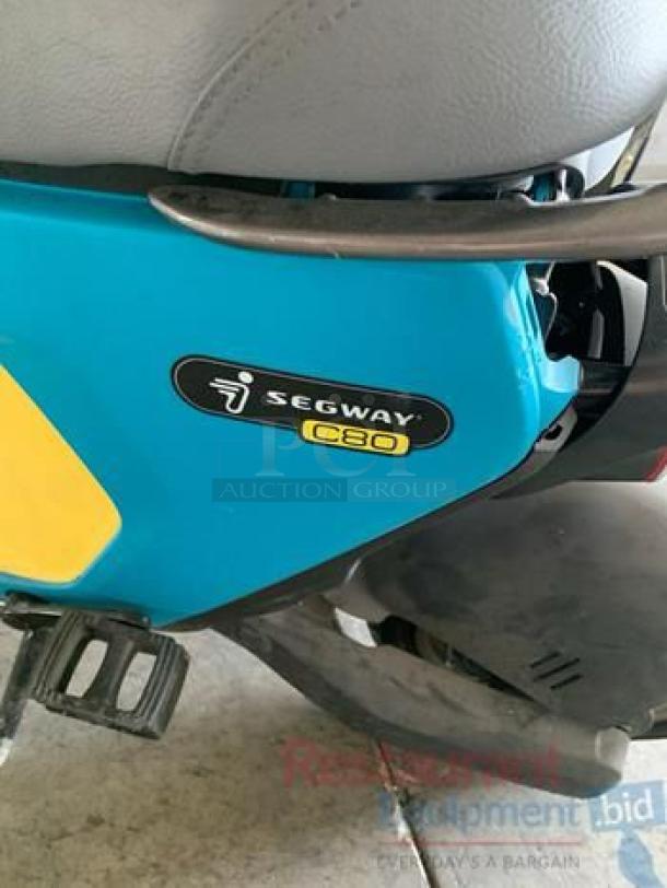 Segway Ninebot C80 electric moped scooter in superb condition, showing logo and model label, includes 115V charger, fully tested.