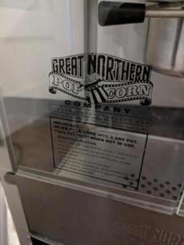 Great Northern Paducah Popper commercial popcorn machine, 120V, in superb condition. Features brand logo and operational instructions.