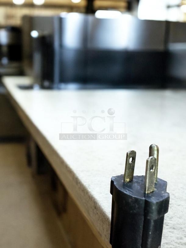 Waring Commercial WSC160 Electric Crêpe Maker plug, showing sturdy prongs, on a countertop, fully tested, 120V.