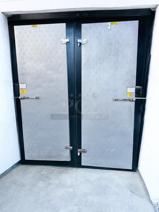 Norlake Walk-In Cooler/Freezer Doors, metal finish, set of 2, fully operational, great condition, visible safety labels.