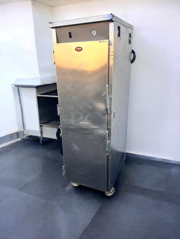 FWE TST-16-EPL heated holding cabinet in outstanding condition, stainless steel, 220V, fully tested and working, on wheels.