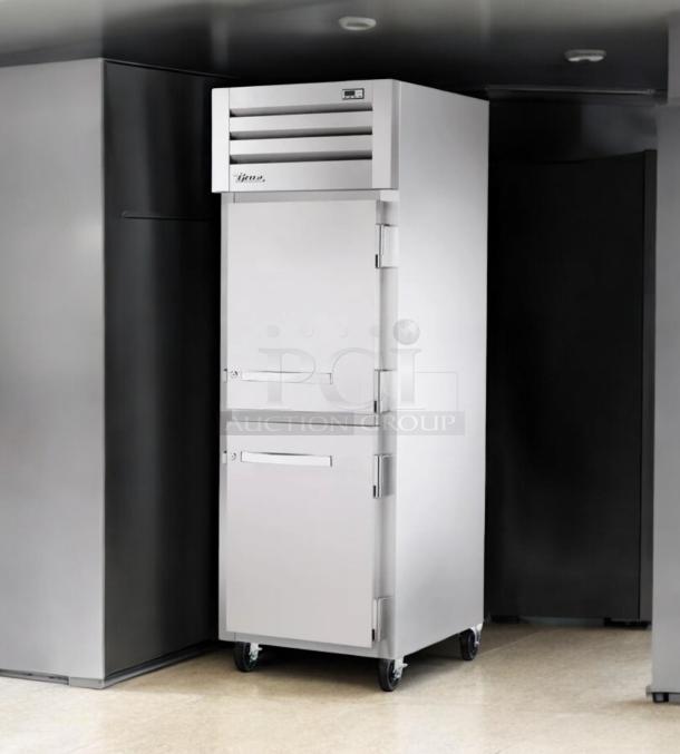 True STM1R-2HS reach-in refrigerator with half doors, 115V, outstanding condition, fully tested and working, on casters.