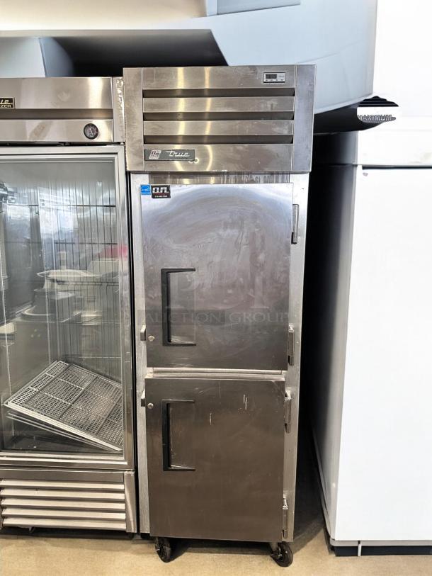 Outstanding True STM1R-2HS refrigerator, single door with half doors, 115V, in excellent condition, fully tested.