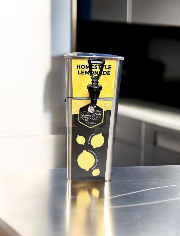 Superb condition Newco FPM-1 Tomlinson beverage dispenser, fully tested, stainless steel, Tomlinson spigot, lemonade label.