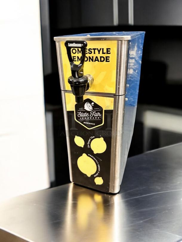 Newco FPM-1 Beverage Dispenser, Tomlinson spigot, excellent condition, labeled “Homestyle Lemonade” and “State Fair Lemonade.”