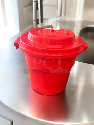 Red Chef Master manual mop bucket with hand-crank wringer in like-new condition, heavy-duty plastic, fully tested.