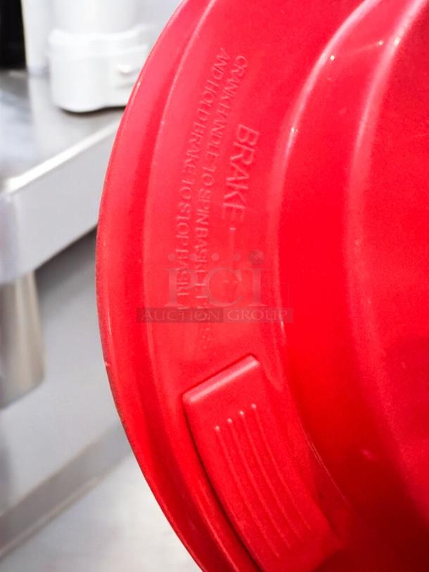 Red Chef Master manual mop bucket with hand-crank wringer, like-new condition. Brake instructions embossed on side.