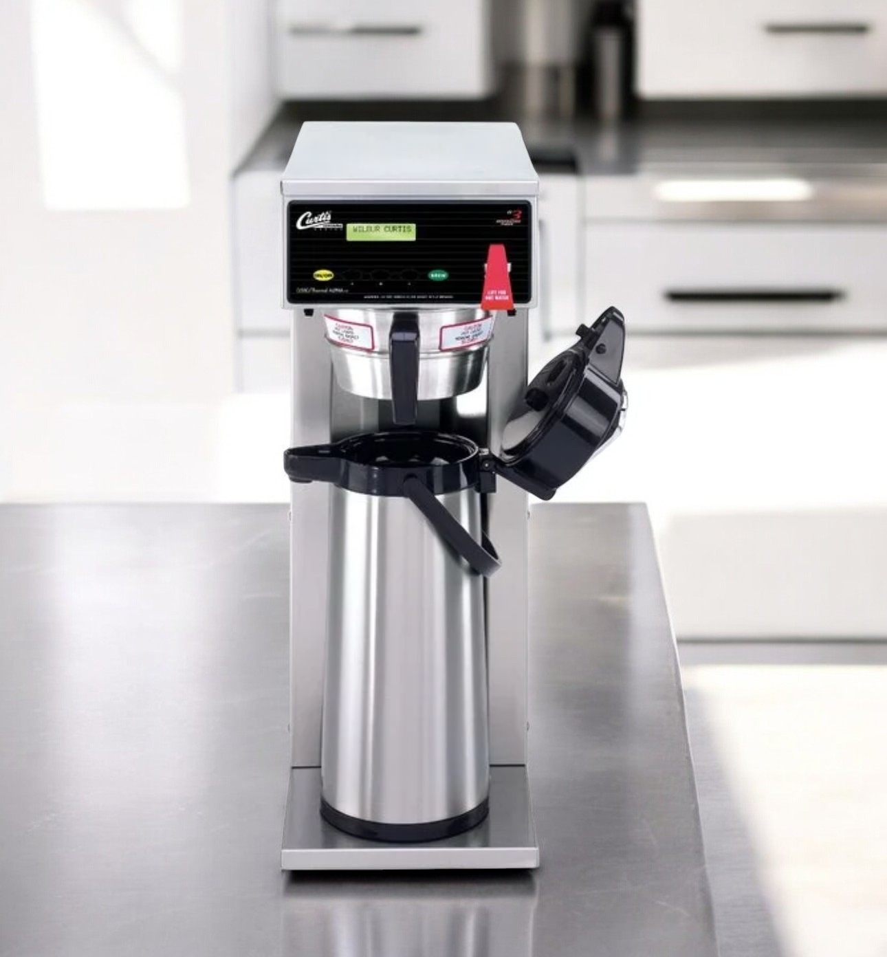 Airpot brewer with thermal airpot carafe in position