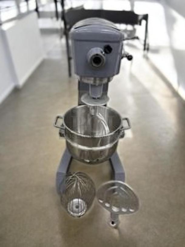 Hobart heavy-duty commercial planetary mixer in excellent condition, includes mixing bowl and attachments, fully tested and working.