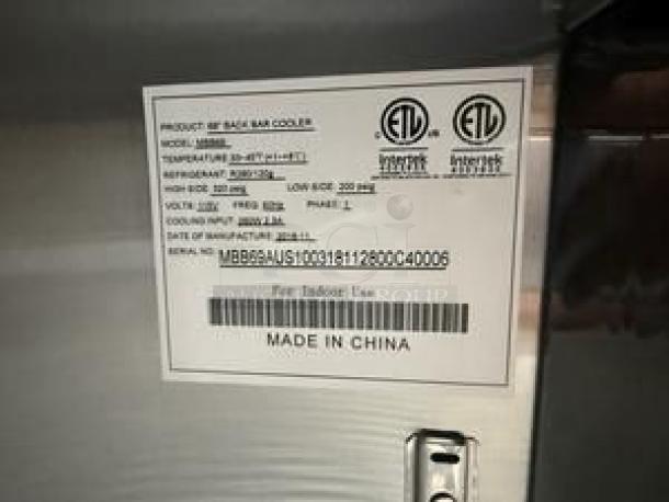 Atosa MBB69 back bar cooler label, 115V, lists specifications for model and serial number. ETL certified, made in China.