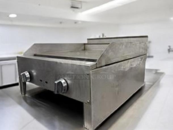 Commercial 24" gas countertop griddle, 2-burner, superior condition, stainless steel, fully tested, perfect for high-demand cooking.
