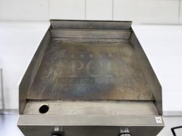 24" stainless steel gas countertop griddle, 2-burner, superior condition, fully tested, ready for commercial use.