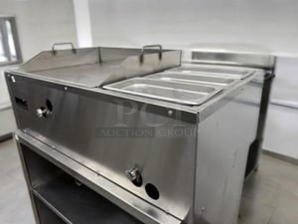 Outstanding condition commercial 36" gas griddle with three steam table wells. Fully tested and working.