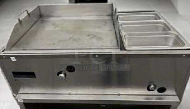 Commercial 36" gas griddle with integrated steam table, outstanding condition, includes three steam wells, fully tested.