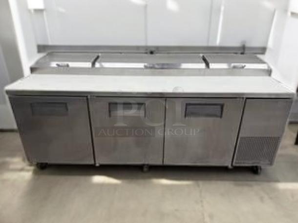 True TSSU-72-18 3-Door Mega Top Sandwich/Salad Prep Table, 72", stainless steel, cutting board, excellent condition.