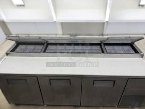 True TSSU-72-18, 3-door mega top sandwich/salad prep table, stainless steel, 72", cutting board, tested, excellent condition.