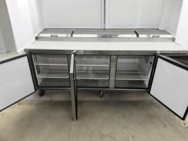 True TSSU-72-18 Mega Top Sandwich/Salad Prep Table, 3-door, cutting board, excellent condition, 72", 115V, fully tested.