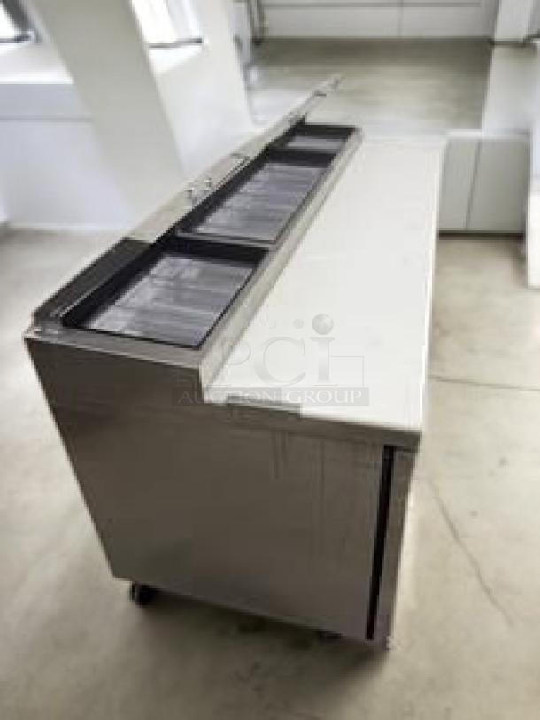 True TSSU-72-18 3-Door Mega Top Sandwich/Salad Prep Table, 72", stainless steel, includes cutting board, fully tested, excellent condition.
