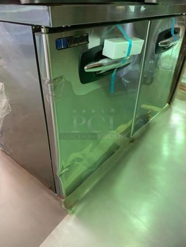 Brand new Migali UR48 undercounter refrigerator with dual solid doors, stainless steel finish, fully tested and working, 115V.