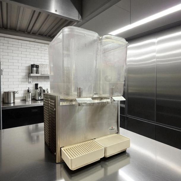 Crathco D25-3 dual bowl beverage dispenser in superb condition; stainless steel body, 115V, fully tested, Crathco logo visible.