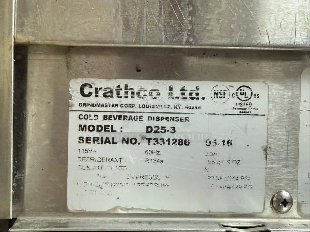 Label on Crathco D25-3 Dual Bowl Refrigerated Beverage Dispenser, displaying model, serial number, and voltage details.