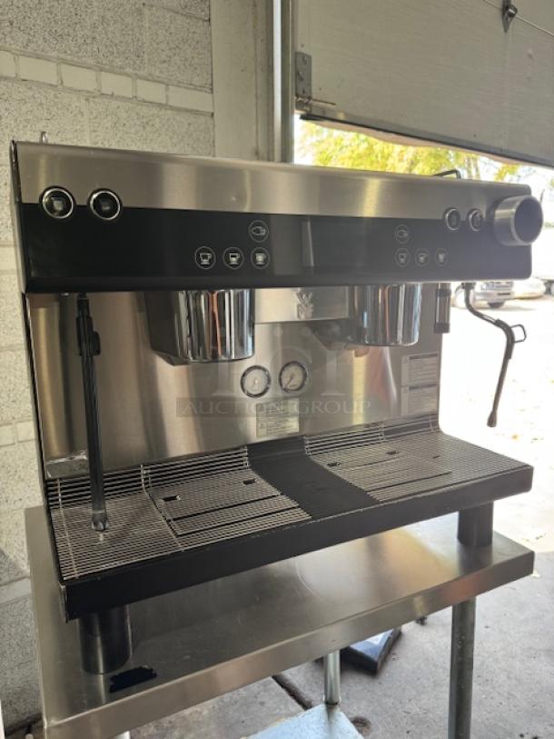 WMF Espresso Model 30.5500 machine with 2 grinders, hot water outlet, manual & automatic steam wands, and heatable cup storage.