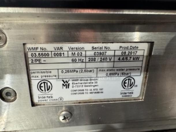 WMF Espresso Machine 30.5500 label showing model, serial number 03907, production date 08.2017, and power specs.