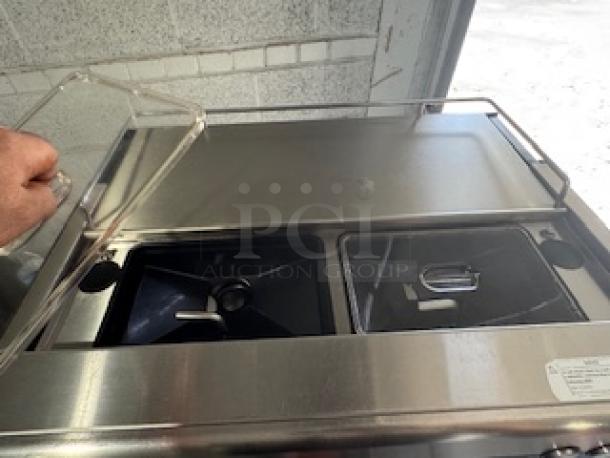 WMF Espresso Model 30.5500 with dual grinders, hot water outlet, steam wands, cup storage, and steam jet, in good condition.