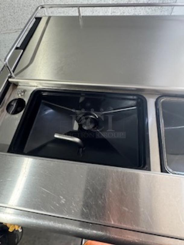 WMF Espresso Machine Model 30.5500 with dual grinders, hot water outlet, two steam wands, cup storage, and steam jet.
