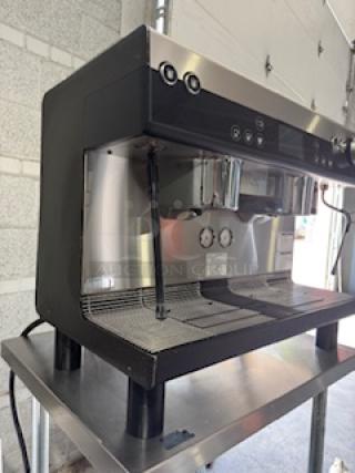 WMF Espresso Model 30.5500 machine with dual grinders, hot water outlet, two steam wands, and steam jet.