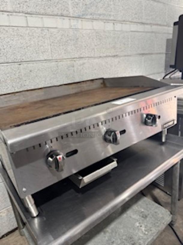Patriot PT-G36-M gas griddle, 36", 90,000 BTU, stainless steel, thermostat-controlled, 3/4" rear NPT gas inlet, good condition.