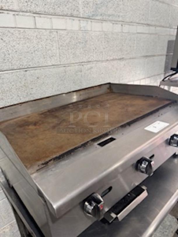 Patriot PT-G36-M gas griddle, 36-inch, 90,000 BTU, thermostat controlled, rear NPT gas inlet, used condition.