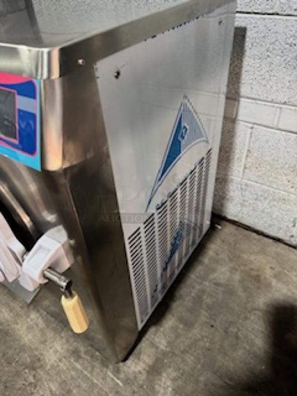 Heavy duty ICM-28 gelato ice cream machine, ETL certified, stainless steel. Features digital display, 110V, 2000W. Used condition.