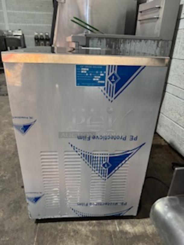 Heavy-duty countertop gelato ice cream machine, ICM-28 ETL certified, 110V, 2000W, with protective film, ready for bars/restaurants.