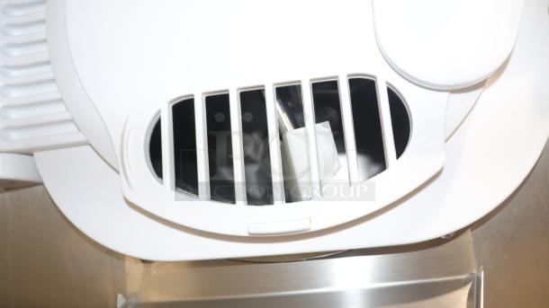 ETL-certified ICM-28 gelato machine with metal vent detail, 110V, 2000W, ideal for commercial use in bars and cafes.
