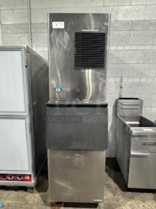 Hoshizaki KM-320MAH ice machine with 556 lb. capacity, 300 lb. storage bin, air-cooled, 115v, in good condition.