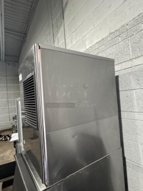 Hoshizaki KM-320MAH Slim-Line Crescent Cube Ice Machine with 300 lb storage, air cooled, stainless steel, 115v, excellent condition.