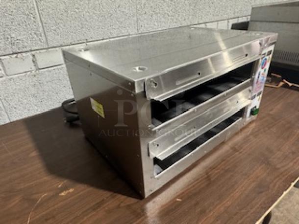 Meister Cook DMW-22-TDL heated holding unit with dual chambers, finned heaters, and stainless steel exterior. Excellent condition.